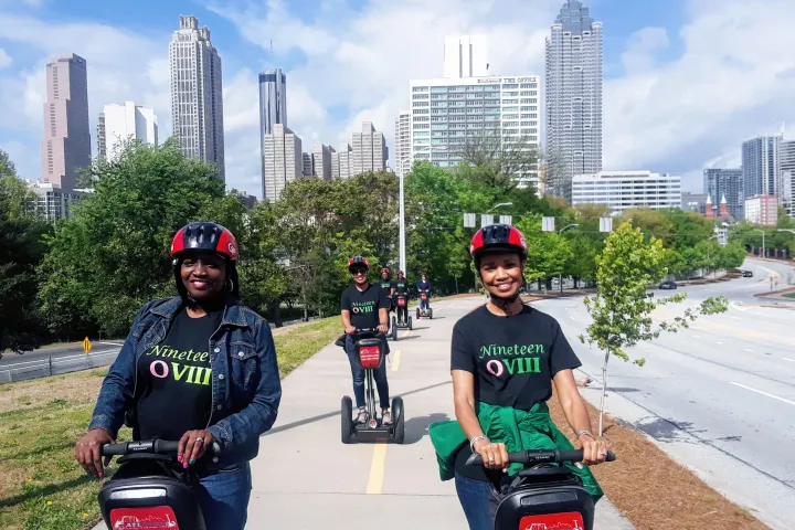 a person riding a motorcycle on a city street