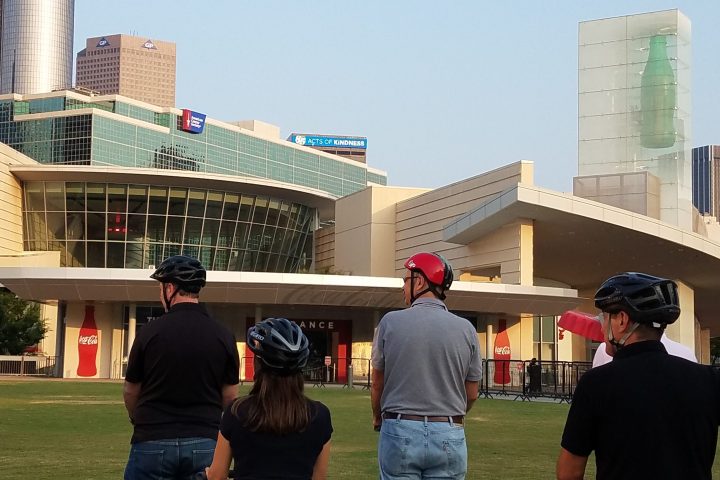 a group of people standing in front of a building
